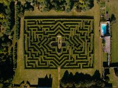 an aerial view of a large maze in the middle of a field