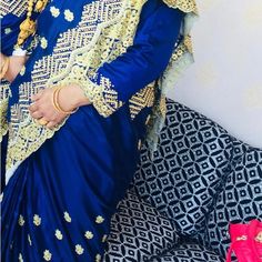 Beautiful Blue Color And Golden Embroidery Work Saree Only Worn Twice But Doesn’t Has Any Sweat Marks Or Stains Looks Brand New. Blue Dola Silk Salwar Kameez With Cutdana, Embroidered Blue Blouse Piece For Party, Elegant Blue Embroidered Fabric For Navratri, Blue Embroidered Saree Dress, Embroidered Blue Saree Dress, Blue Long Sleeve Salwar Kameez With Dori Work, Blue Dola Silk Saree Dress, Blue Embroidered Saree Fabric For Party, Blue Embroidered Fabric Saree For Party