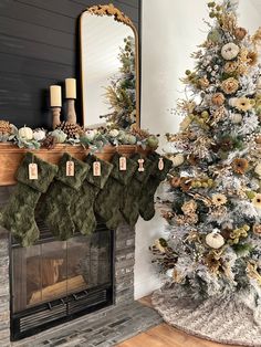 a decorated christmas tree sitting next to a fireplace