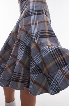 A classic plaid pattern accentuates the artsy, purposely disjointed look of this skirt cut with swooping asymmetric seams. 26" length (size Ts-8) Hidden side-zip closure 97% Cotton,3% Elastane Machine wash, line dry Imported Fitted Plaid Tiered Skirt, Plaid A-line Skirt With Lining, Fitted Cotton Plaid Skirt, Plaid Tiered Lined Skirt, Plaid Cotton Skirt For Work, Plaid Tiered Ruffled Skirt, Plaid Flared Relaxed Fit Skirt, Plaid Cotton Flared Skirt, Plaid Flared Skirt With Relaxed Fit