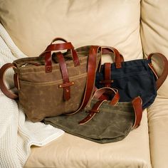 Constructed with durable waxed canvas and finished with brown vegetable tanned leather, our Tote is a blank slate waiting to be marked with the adventures and stories of use. This is the holy grail in unisex carryall totes: practical and perfect in every way. This tote was built to endure. Load it up, bring it everywhere. For those city dwellers, travelers and others wanting more security, the Tote has a separating zipper that tucks neatly in the bag when not needed. Waxed canvas originated in t Everyday Duck Canvas Bag With Leather Patch, Duck Canvas Bag With Leather Patch For Everyday Use, Vintage Bags With Leather Patch For Everyday, Everyday Waxed Canvas Bag With Leather Patch, Waxed Canvas Travel Bag With Waxed Finish, Rugged Everyday Coated Canvas Bags, Everyday Rugged Bag With Leather Patch, Rugged Bag With Leather Patch For Everyday Use, Rugged Canvas Shoulder Bag For Everyday Use