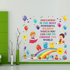 a child's room with a rainbow wall decal