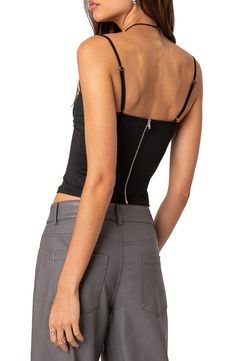 Get the alluring look of a corset in the comfort of jersey wearing this cropped cami with seams that mimic boning and bra cups and wide-set adjustable straps. A gleaming exposed zip continues the captivating look around to the back view. Exposed back-zip closure Square neck Adjustable straps 95% polyester, 5% spandex Machine wash, dry flat Imported Stretch Camisole Corset With Built-in Bra, Trendy Corset With Built-in Bra And Spaghetti Straps, Fitted Crop Tube Top With Built-in Bra, Elastane Camisole With Built-in Bra For Night Out, Fitted Crop Top Camisole With Built-in Bra, Fitted Tube Top With Corset Back And Spaghetti Straps, Fitted Cami Corset With Built-in Bra, Fitted Tube Top With Built-in Bra And Tank Straps, Chic Camisole Corset With Adjustable Straps