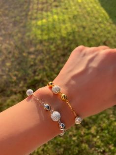 "✦ DESCRIPTION ✦ Radiant diamonds pave a dainty sphere station centering this delicate ball-chain bracelet handcrafted in 18K Gold Plating / White Rhodium plating in Sterling Silver. This Bracelet can be adjusted 6.5\" to 7\" inch. Bracelet Length 6.5\" inch Extension 1\" inch. ✦ Dear Customers ✦ We strive to provide the best quality with affordable prices. We take such pride in making sure to create unique, beautiful jewelry for all our Sioro Silver customers, and always seek to provide the ver Silver Disco Ball, Ball Chain Bracelet, Cross Earrings Studs, Bracelet Diamond, Minimalist Studs, Ball Bracelet, Wedding Jewelry Bracelets, Bracelet Sterling Silver, Sterling Silver Cross