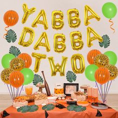 PRICES MAY VARY. Jungle Safari Party Decorations: Package include 5*12 inch gold leopard latex balloons; 5*12 inch light green latex balloon; 5*12 inch orange watermelon printing latex balloon; 1*16 inch yabba dabba two foil balloons; 10*6.8 inch artificial palm leaves. Various types of balloons with artificial palm leaves can make your party balloons look more vivid and beautiful. Jungle Themed Balloons Garland Kit: Gold leopard balloons, light green balloons and orange balloons can create a jungle atmosphere for your party. You can match them freely to complete your own jungle theme balloons decoration. Yabba Dabba Two Balloons Decorations: The gold “Yabba Dabba Two” foil balloons is inspired by the classic lines of stones, very suitable for the two year old kids birthday. This 2nd birth Jungle Safari Party Decorations, Two Wild Party, Safari Party Decorations, Jungle Balloons, Background Circle, Artificial Palm Leaves