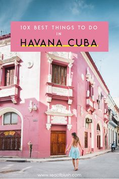 a woman walking in front of a pink building with the words 10 best things to do in havana cuba