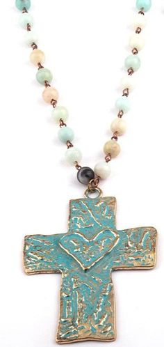 Amazonite chain with a beautiful metal heart cross. Pendant size: 8.5x6cm Metal Type: Zinc Alloy Beads: Approx: 8mm Length: 86cm without pendant Since each natural stone is unique (just like you ❤️), colors and shape will vary slightly from necklace to necklace, making this beautiful handmade item truly one of a kind. Coast Cowgirl, Stretch Beaded Bracelets Diy, Cowgirl Necklaces, Turquoise Bead Necklaces, Multi Layer Necklace, Necklace Making, Neck Jewellery, Metal Heart, Beaded Anklets