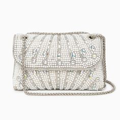 Silver Chic Embellished Crystal Evening Bag, Embellished Crystal Clutch For Evening, Embellished Crystal Evening Clutch, Chic Embellished Crystal Bag, Glamorous Crystal Evening Bag With Rhinestones, Glamorous Crystal Evening Bag With Bling, Glamorous Crystal Embellished Bags, Glamorous Rhinestone Evening Bag, Glamorous Silver Shoulder Bag With Rhinestones