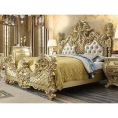 an ornately decorated bedroom with gold furniture