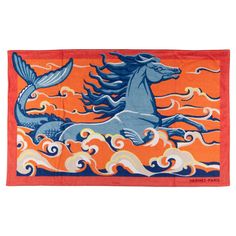 an orange and blue towel with a horse in the sky on it's side