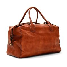 Handcrafted in soft leather and hand polished for a vintage patina, the John Woodbridge Weekend Bag will be your faithful companion for a quick getaway or your trips to the gym. This cabin-sized model is ready to hop on a plane whenever you are. For all you boxers out there: It has room enough to fit your gloves.- Dimensions : 50 x 25 x 25 cm- One pocket with zip closure- One pocket for your phone/passport- Interior lining in cotton- Removable, adjustable leather strap Rugby Ball, Leather Weekender Bag, Quick Getaway, Punching Bag, Overnight Bags, Weekend Bag, Vintage Baseball, Wood Bridge, A Plane