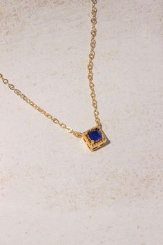 PRODUCT DESCRIPTION Chic and sophisticated, this Diane Necklace is inspired by the glamour of bygone eras. This opulent piece is crafted in 18k Gold-plated or 14k Gold-filled with metal and features a blue square-cut cubic zirconia pendant. Effortlessly elegant and pairs beautifully with day and evening ensembles. You are fine to shower in our gold-filled jewelry. Get it wet, wear it for life! A Dainty yet Elegant Necklace Water and Tarnish Resistant 14k Gold-filled with jeweler's brass (at leas Gold Sapphire Jewelry Gift, Gold Sapphire Jewelry For Gift, Gold-plated Sapphire Jewelry For Anniversary, Gold Plated Sapphire Jewelry For Anniversary, Classic Gold Sapphire Jewelry, Blue Rectangular Diamond Cut Jewelry, Gold Sapphire Gemstone Jewelry, Square Diamond-cut Jewelry For Formal Occasions, Blue Birthstone Jewelry In Gold Plated