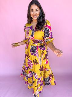 This chic Golden Bloom Dress features an all-over floral pattern and a midi length for a stylish look. It also includes ruffle details, a v-neckline, and short sleeves. Perfect for fall, it pairs easily with sneakers, booties, or mules, and even has convenient pockets! V-Neckline Short Sleeves Smocked Waistline Midi Length Material is 100% Cotton Fit is True to Size Jincy is 5’8”, 36DDish bust, size 9ish bottoms, size M tops, and wearing a L. *Actual product color may vary slightly from the imag Bloom Dress, Christmas Youth, Denim Accessories, Capri Blue, Outerwear Vest, Plus Size Shopping, Boy Tees, Tee Dress, Vest Top