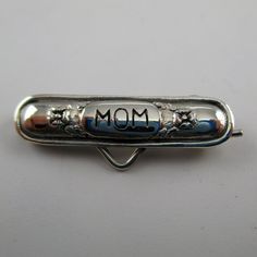 "This antiqued, sterling silver Mom Pin-Small features a sterling wire clip on back for the easy addition or removal of a single charm. Pins are easily attached to blouses, sweaters, jackets, jeans and other apparel and accessories. Vintage, but in brand new, never worn condition. Made by Brown County Silver. 1 1/8\" wide 2.4 grams See more @ https://www.etsy.com/shop/brocosi" Personalized Silver Brooches For Anniversary, Personalized Silver Pins For Anniversary, Pin Charms, Brown County, Charm Holder, Beste Mama, Scarf Pin, Small Charms, Love Charms