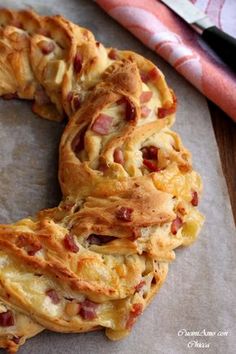 some type of pastry with bacon on it