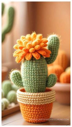 a crocheted cactus sitting in a small pot