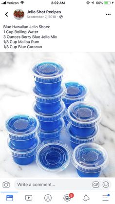 blue jello shots are stacked on top of each other