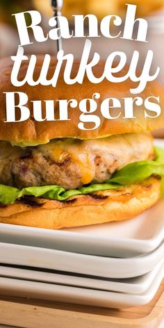 a close up of a sandwich on a plate with the words ranch turkey burgers