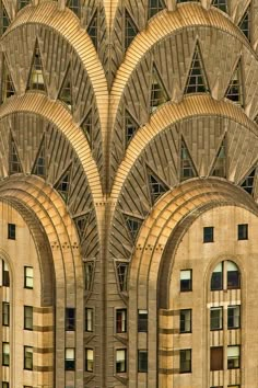 an art deco building with arches and windows