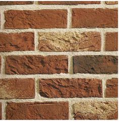 a brick wall that has been made from red bricks and is very light brown in color