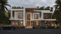 a car is parked in front of a two story house with palm trees around it