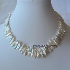 Welcome to my shop my dear friend. I hope you will like my jewelry, and most of my jewelry are made by myself. Please see the detail for this item: Pearl Jewelry: necklace  Pearl Type: biwa pearl size : around 5-7 mm * 13-20 mm color: white  surface: good length:around 43 cm + 3.5 cm extension chain in the pictures About shipping: I will send out your orders as soon as I can. Usually the parcel will take about 10-20 business days arrive. Sometimes maybe have a little delay. As seller, I really hope you can receive your parcel the earlier the better. Any questions, please feel free to contact me! Please make sure your address is complete and accurate, and try to avoid using abbreviations. Happy shopping. White Baroque Pearl Beads For Jewelry Making, White Baroque Pearl Beaded Necklaces For Jewelry Making, White Baroque Pearl Shell Necklace, Handmade Baroque Pearl Shell Necklace, Handmade White Baroque Pearl Shell Necklace, White Mother Of Pearl Necklace With Pearl Drop, White Pearl Drop Necklace In Mother Of Pearl, Biwa Pearl Necklace, Biwa Pearls