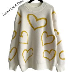 Trendy Winter Sweater With Heart Graphic, Trendy Heart Print Sweater For Winter, Winter Heart Graphic Sweater, Winter Heart Print Sweater, Winter Sweater With Heart Graphic, Winter Heart-shaped Sweater With Heart Print, Trendy Winter Sweater With Heart Design, Trendy Fall Sweater With Heart Print, Cute Heart Print Winter Sweater