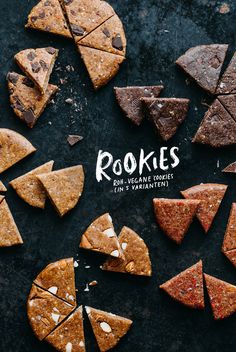 cookies are arranged on a black surface with the words rookes written above them