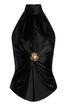 Experience luxury and elegance with our Rachel Top. Made from silk, this halter top boasts a sleeveless design and features a keyhole and brooch detail. Perfect for a night out, its black color adds sophistication to any outfit. Indulge in comfort and style with the Rachel Top. Details Zipper closureFabric: SilkHalter silhouetteKey hole detailSleeveless Content and Care 100% SilkDry CleanImported Measurements 22.75in/57.79cm from necklineMeasurements from size S