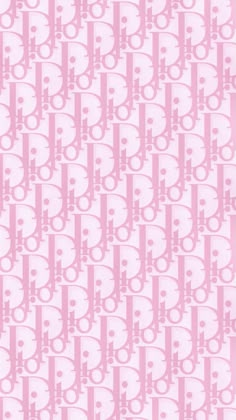 a pink and white pattern with skulls on it