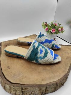 Handmade genuine leather women's slip on. Made with handwoven velvet ikat, natural leather and leather soled. Every size available. İf you like to have other colour please send us messages. Handmade. Very comfy and useful. Made in Turkey. We have door to door express shipping service. İf you have any questions please contact with us. bemyboots.etsy.com Thank You Handmade Artisan Mules For Summer, Handmade Casual Mules, Traditional Handwoven Slip-on Sandals, Casual Handwoven Slip-on Sandals, Artisan Handmade Slip-on Mules, Casual Handmade Open Toe Mules, Natural Handwoven Slip-on Sandals, Natural Color Slippers With Woven Sole, Woven Leather Open Toe Mules