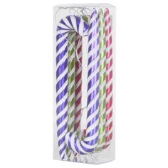 three colorful striped paper straws in a package