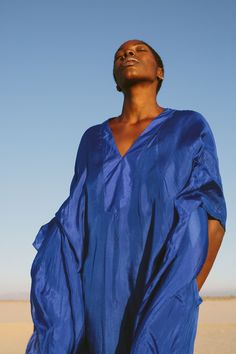 caftan kaftan tunic maxi dress blue dress little blue dress silk dress boho style bohemian style eco-luxury eco luxe sustainable brands Los Angeles brands Chic Blue Kaftan For Beach Cover-up, Blue Silk Kaftan For Beach Cover-up, Chic Blue Kaftan Beach Cover-up, Chic Blue Long Sleeve Kaftan, Blue Tunic With Kimono Sleeves, Blue Flowy Silk Kaftan, Oversized Blue Kaftan Tunic, Blue Tunic With Kimono Sleeves For Spring, Blue Silk Tunic Kaftan