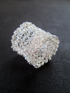 #Wire #crochet #ring by LogicFreeDesign Handmade Delicate Metal Jewelry, Delicate Handmade Metal Jewelry, Unique Crochet Jewelry As A Gift, Unique Crochet Jewelry As Gift, Unique Crochet Jewelry For Gifts, Elegant Adjustable Crochet Jewelry, Handmade Wide Band Metal Ring, Handmade Silver Wide Band Jewelry, Ring Crochet