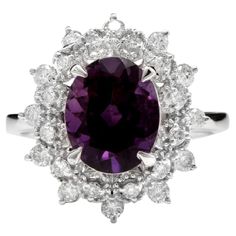 3.60 Carats Natural Amethyst and Diamond 14K Solid White Gold Ring Total Natural Oval Shaped Amethyst Weights: Approx. 3.00 Carats Amethyst Measures: Approx. 10 x 8mm Natural Round Diamonds Weight: Approx. 0.60 Carats (color G-H / Clarity SI1-SI2) Ring size: 7 (we offer free re-sizing upon request) Ring total weight: Approx. 4.3 grams Disclaimer: all weights, measurements and colors are approximate and may vary slightly from the listed dimensions or as seen in the image. All pictures are magnifi Emerald Cut Aquamarine Ring, Crystal Goddess, Amethyst And Diamond Ring, Emerald Cut Rings, Diamond Jewelry Designs, Etsy Gold Ring, Amethyst Gem, Tourmaline Ring, Bling Rings