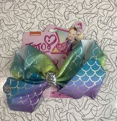 Nickelodeon JoJo Siwa hair bow new in original packaging mermaid pattern. Condition is "New with tags". Shipped with USPS First Class. Jojo Siwa Hair, Mermaid Pattern, Jojo Siwa, Girls Characters, First Class, Nickelodeon, Hair Bow, Christmas Ideas, Hair Bows