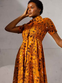 This dress is a testament to our artisans in Nigeria who have meticulously handcrafted fabric sourced from Lagos markets into a garment that transcends fashion and becomes an expression of individuality and a force for good. Fabric: Lightweight non-stretch crisp weave Collared neckline and button placket Short sleeves Floral print On-seam side pockets Shell: 100% cotton Unlined Care: Hand or machine wash in cold water. Do not bleach. Tumble dry low. Fit: True to size As with all our products, ev A Force, Dresses Xxl, Dress Shirts For Women, Spring Dresses, Mommy And Me, Button Placket, Cold Water, Bleach, Force