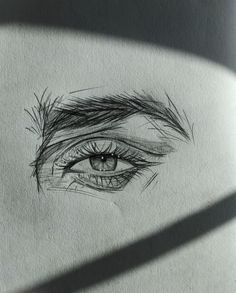 a pencil drawing of an eye with long lashes on it's forehead and the shadow of a person's head