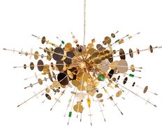 a chandelier with many different colored glasses hanging from it