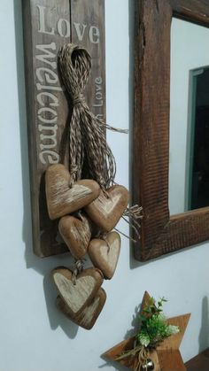 some wooden hearts hanging on a wall