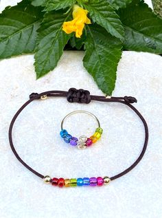 RAINBOW FIDGET RING & Bracelet Set for Kids, in Adjustable Sizes, wire wrapped with chakra color beads Adjustable Rainbow Beaded Bracelets For Meditation, Adjustable Rainbow Crystal Bracelet Gift, Rainbow Hand-strung Stretch Bracelet Gift, Adjustable Fidgit Rings, Rainbow Adjustable Hand-strung Stretch Bracelet, Spinner Toy, Fidget Rings, Chakra Colors, Color Beads