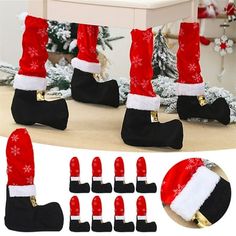 christmas stockings and boots with santa claus's hat on them, sitting in front of a table