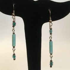 Handmade Beaded Pierced Dangle Earrings. Aqua And Teal Green Beads. Silver Tone Metal. Light Weight Earrings Approx. 2 1/2" Long. New With Tag. Adjustable Silver Beaded Dangle Earrings, Beaded Silver-plated Wire Dangle Jewelry, Beaded Dangle Earrings With Silver Plated Wire, Beaded Silver-plated Dangle Jewelry, Elegant Beaded Silver-plated Wire Earrings, Aqua Earrings, Light Weight Earrings, Teal Green, Green Bead