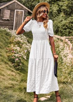 This maxi dress has a smocked bodice and tiered skirt for a breezy, romantic look. Perfect for a day at the beach or a night out, this dress will make you feel like you're living in a seaside fantasy. (No boring ol' landlubber attire here, matey!) Size Guide: Model is 5’8” tall, and has a 33.8” bust, 24.2” waist, & 35.7” hips. She is wearing a S / US 4 / AU 8. This dress is true to size. Material: Self: 100% Nylon, Lining: 100% Polyester Feature: V-Neckline. Short Sleeves. Crochet waist. Lace fabrication. Lined. Maxi length. Flowy fit. Care Instructions: Machine wash / Cold hand wash Fitted Tiered Summer Maxi Dress, Fitted Midi Dress With Tiered Skirt For Vacation, Breezy Maxi Dress With Tiered Skirt For Day Out, Maxi Length Smocked Dress For Garden Party, Fitted Tiered Dress For Beach, Bohemian Smocked Dress With Ruffle Hem For Vacation, Fitted Smock Maxi Dress For Vacation, Fitted Smocked Back Tiered Dress For Beach, Fitted Tiered Skirt Maxi Dress For Vacation