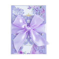 a purple card with a large bow on it