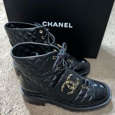 Absolutely No Trades Firm Price -Holiday 22/23 Edition -Chanel Lace Up Calfskin & Shiny Calfskin Leather Boots -Quilted Design -Black Leather -Lace Up -Large Gold Chanel Logos -Size 38.5 -New In Box & Two Dust Bags -Never Used Only Tried On -Authentic -Poshmark Authenticates For Free Key Words Only: Chanel Boots 2023 Luxury Calf Leather Boots For Winter, Luxury Calf Leather Winter Boots, Luxury Winter Boots With Lug Sole, Luxury Round Toe Boots For Fall, Luxury Winter Boots With Round Toe, Luxury Calf Leather Boots With Lug Sole, Luxury Ankle Boots With Lug Sole, Luxury Leather Boots With Lug Sole, Luxury Closed Toe Boots For Fall