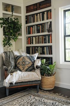 a living room with bookshelves and a couch in front of a potted plant