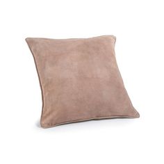 a square pillow with a light brown suede finish on the front and back sides