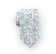 "Infuse a touch of whimsy into wedding aesthetics with this handmade cotton necktie adorned in a playful floral print. It's the perfect accessory for the groom and groomsmen in your Spring wedding. Pair it with a range of lightweight suits for a polished look in a classic-style wedding or let it add a pop of color to more relaxed, outdoor ceremonies. This tie isn't just great for weddings. It's an ideal choice for parties, proms, a romantic date and other special occasions - an excellent gift fo White Ties As Spring Gifts, White Ties For Spring Gift, Elegant Cotton Ties For Gifts, Fitted Cotton Ties For Wedding, Elegant White Ties For Spring, Summer Wedding Cotton Ties, Cotton Ties For Weddings, Fitted Spring Wedding Ties, Cotton Wedding Ties