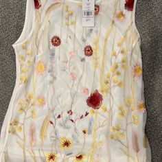 Nwt Suzy Shier Embroidered Knit Tank Top Size Small-Never Worn. 100% Polyester With Embroidered Mesh Front Detail And Solid Back. White Fitted Top With Machine Embroidery, Fitted White Top With Machine Embroidery, White Sleeveless Top With Floral Embroidery, Fitted White Tops With Machine Embroidery, White Sleeveless Embroidered Top, White Floral Embroidered Sleeveless Top, White Tops With Machine Embroidery For Spring, White Machine Embroidered Tops For Spring, White Embroidered Top With Floral Embroidery For Spring